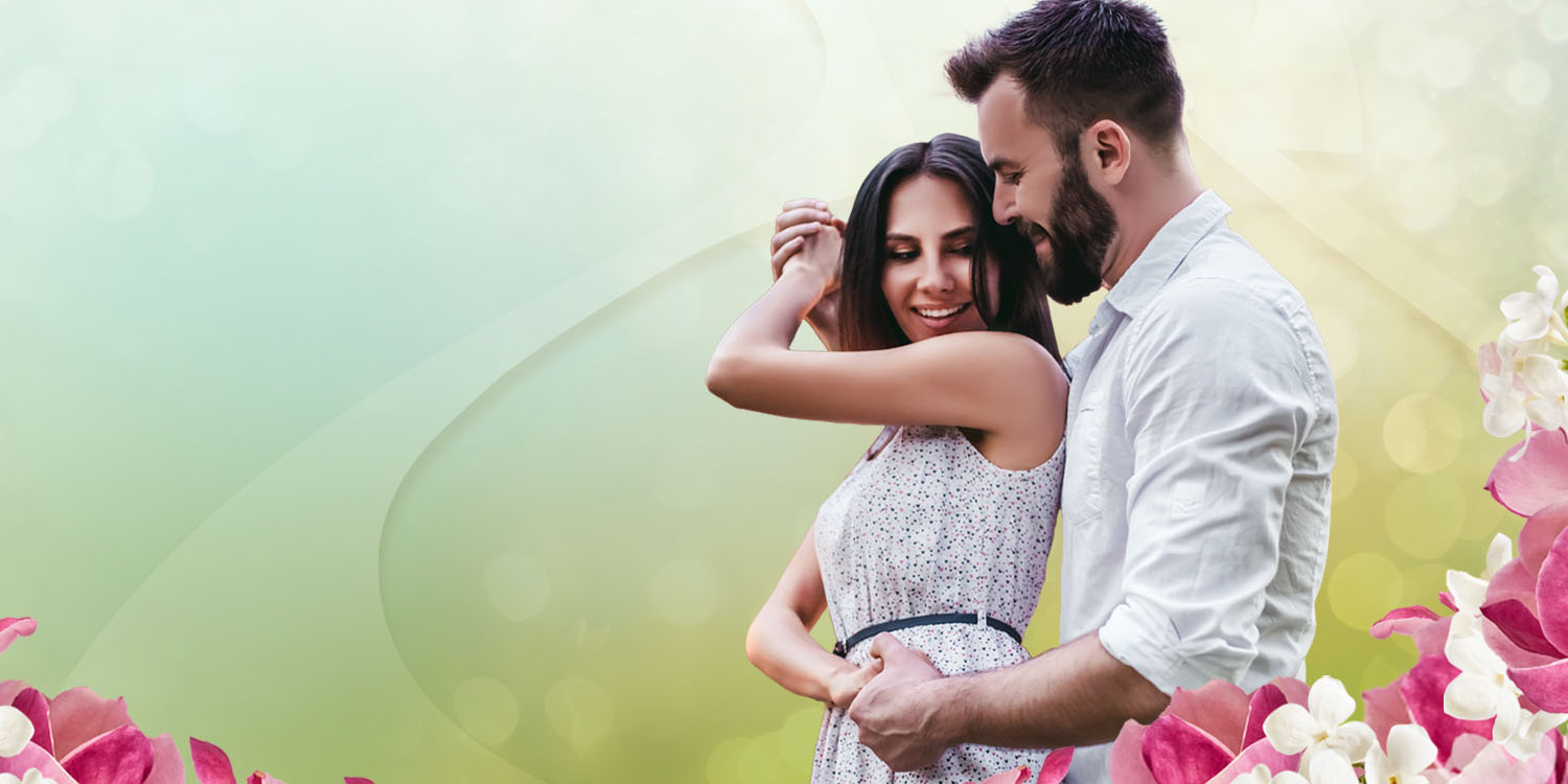 Young couple dancing together in the Spring