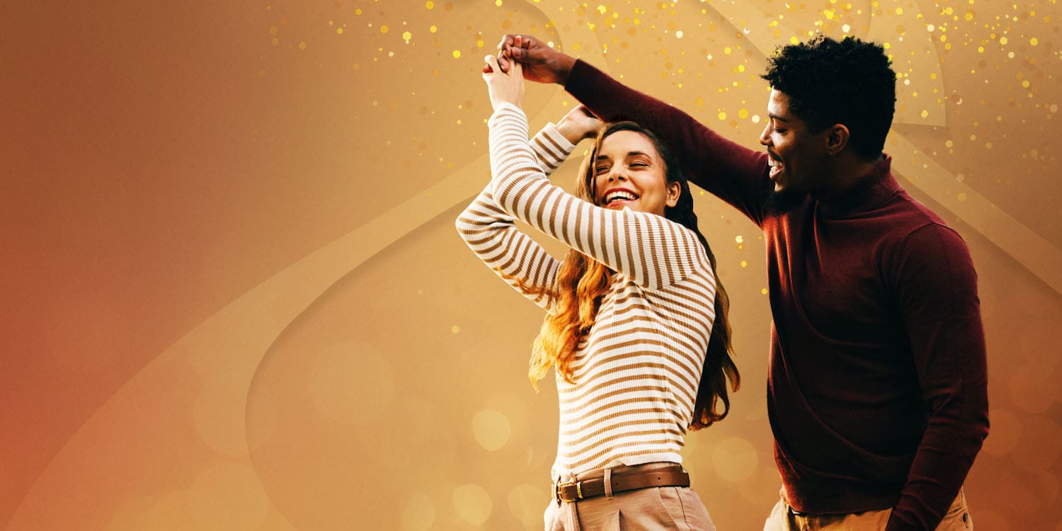 Young couple dancing in the Fall