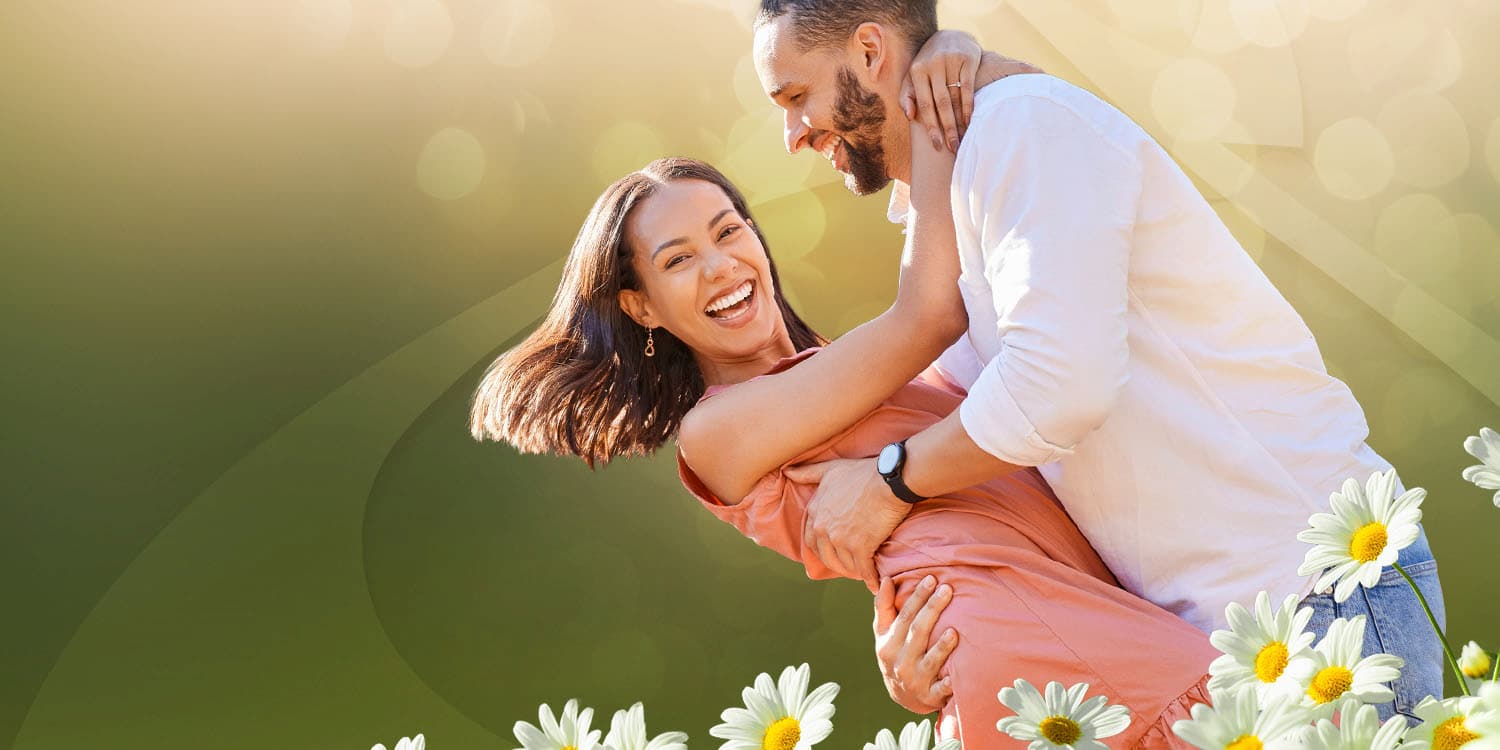 Young couple dancing together in Spring